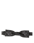 Dark gray geometric Dolce & Gabbana men's adjustable bow tie displayed on a plain background.