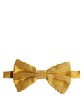 Dolce & Gabbana men's yellow silk adjustable bow tie with papillon design, showcasing luxurious fabric and elegant style.