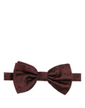 Dolce & Gabbana burgundy silk polka dot papillon bow tie with adjustable neck strap, stylish accessory for formal wear.