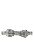 Dolce & Gabbana men's silver and black polka dot adjustable neck bow tie on a display.
