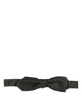 Black dotted silk Dolce & Gabbana men's adjustable neck bow tie with papillon style and elegant design.