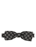 Dolce & Gabbana dark gray and white geometric silk bow tie with adjustable neck strap, styled for formal wear.
