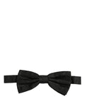 Dark gray paisley silk bow tie from Dolce & Gabbana with adjustable neck strap, featuring a classic and elegant design.