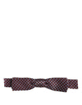 Dolce & Gabbana blue and burgundy woven adjustable neck papillon bow tie laid flat.