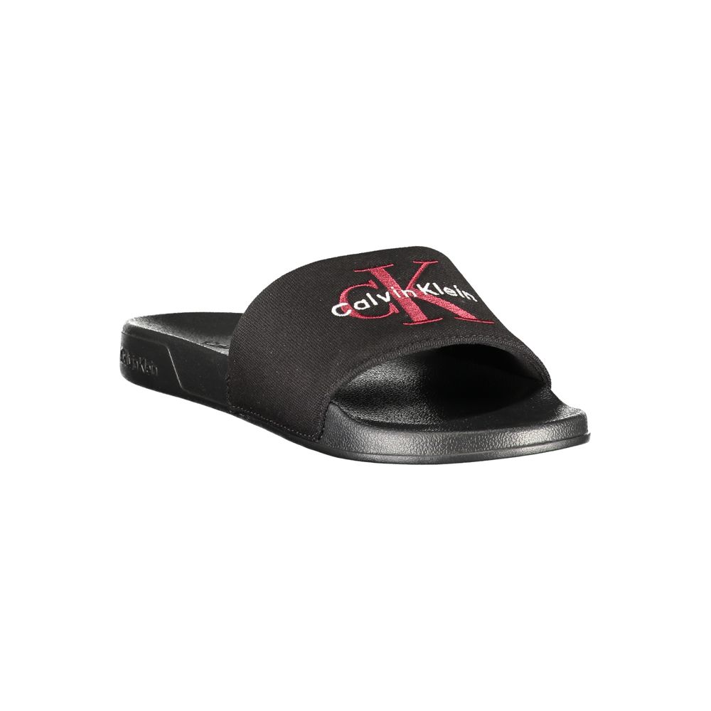 Calvin Klein black polyester men's slipper with slip-on design and cushioned sole, ideal for indoor comfort.