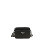 Prada black nylon shoulder bag with adjustable strap and sleek design, suitable for casual or stylish everyday use.