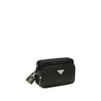 Prada black nylon shoulder bag with adjustable strap and sleek design, featuring subtle branding and functional storage compartments.
