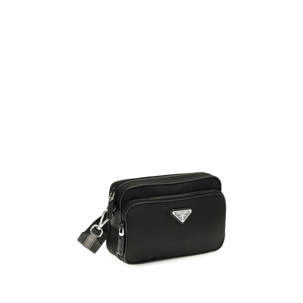 Prada black nylon shoulder bag with adjustable strap and sleek design, featuring subtle branding and functional storage compartments.
