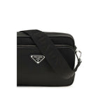 Prada black nylon shoulder bag with adjustable strap and sleek design, featuring subtle logo detailing and durable construction.