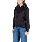 Black cotton hoodie from Calvin Klein Jeans with logo detail, front view showing the casual, comfortable fit.