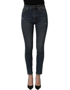 Blue cotton stretch skinny denim trousers by Dolce & Gabbana, featuring classic five-pocket style and slim fit design.