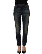 Dolce & Gabbana blue cotton stretch skinny denim jeans displayed on a hanger, showcasing fitted style and classic five-pocket design.
