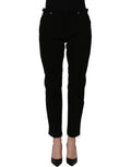 Black cotton skinny denim trouser jeans by Dolce & Gabbana, shown on a model, featuring a fitted silhouette and classic five-pocket design.