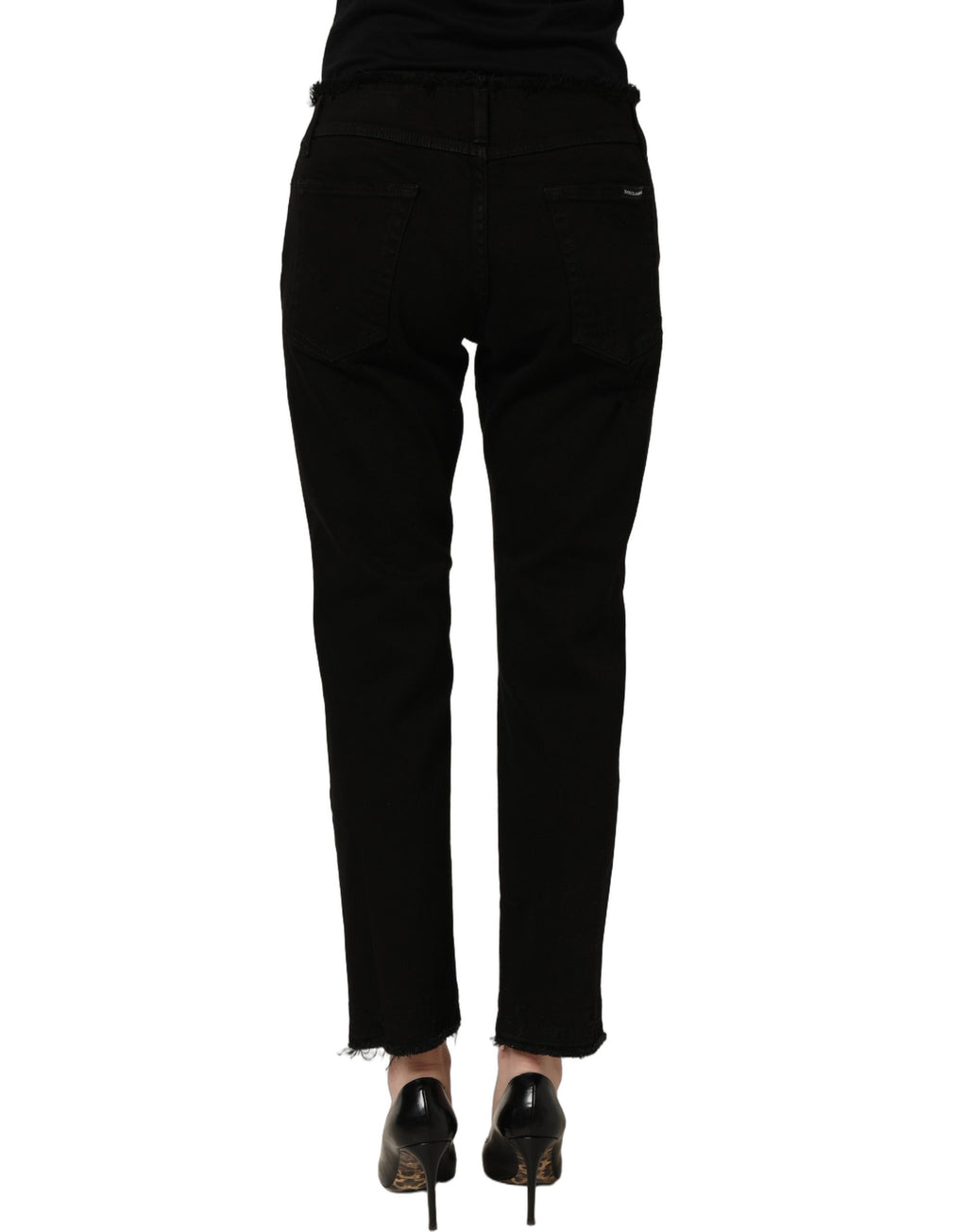 Dolce & Gabbana black cotton skinny denim trousers with classic five-pocket design and slim fit style.