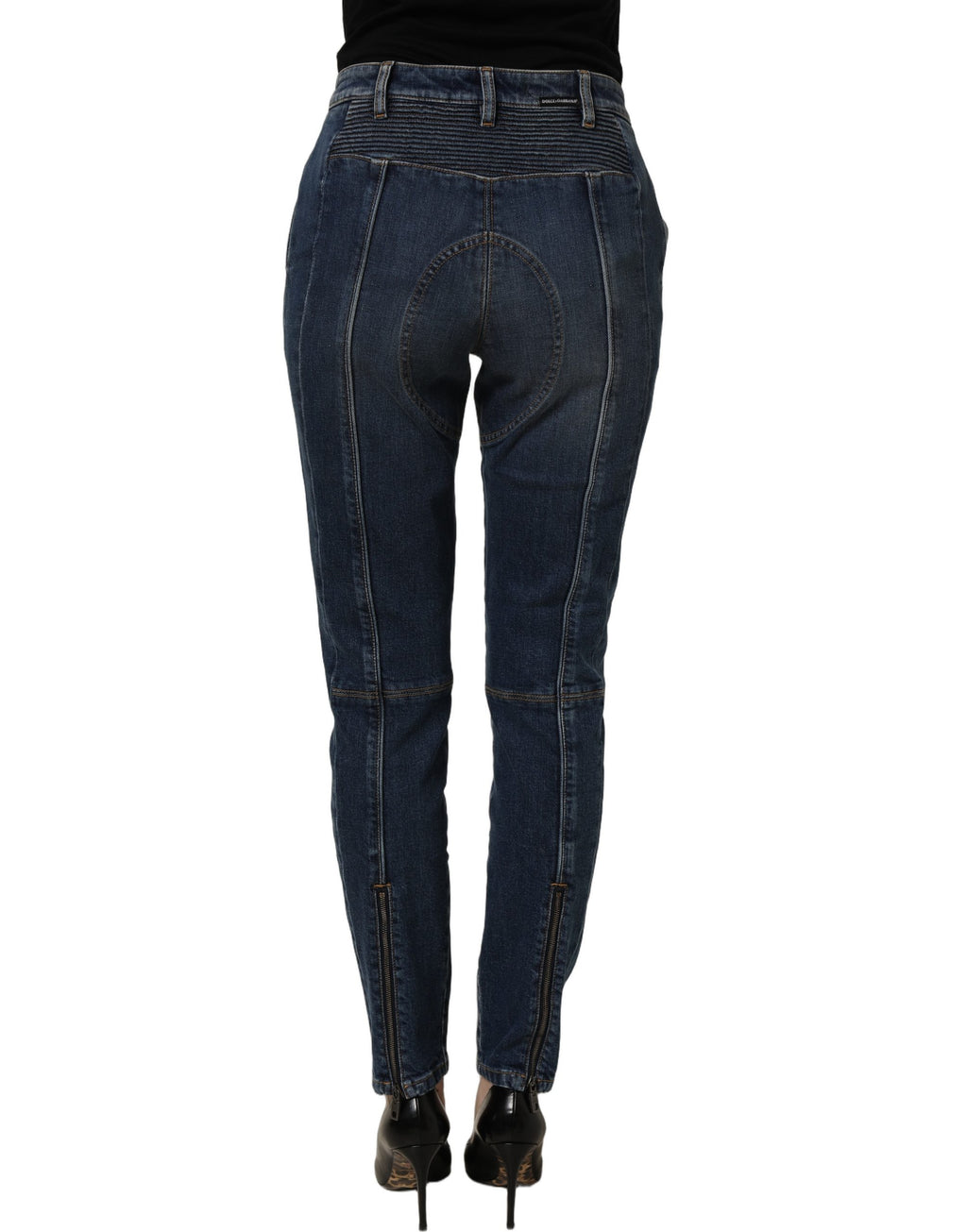 Dark blue Dolce & Gabbana cotton stretch skinny denim jeans shown on a model, highlighting the fitted style and sleek design.