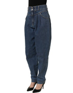 Dark blue cotton stretch tapered denim jeans by Dolce & Gabbana with classic five-pocket design and subtle branding.