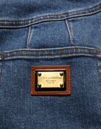 Dark blue cotton stretch tapered denim jeans by Dolce & Gabbana, showing classic fit and detailed stitching.