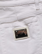 Dolce & Gabbana white cotton low rise denim hot pants shorts, showcasing a fitted style and classic denim design.