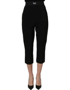 Black Dolce & Gabbana viscose high-waist capri trousers with tailored fit and wide-leg style, shown on a model.