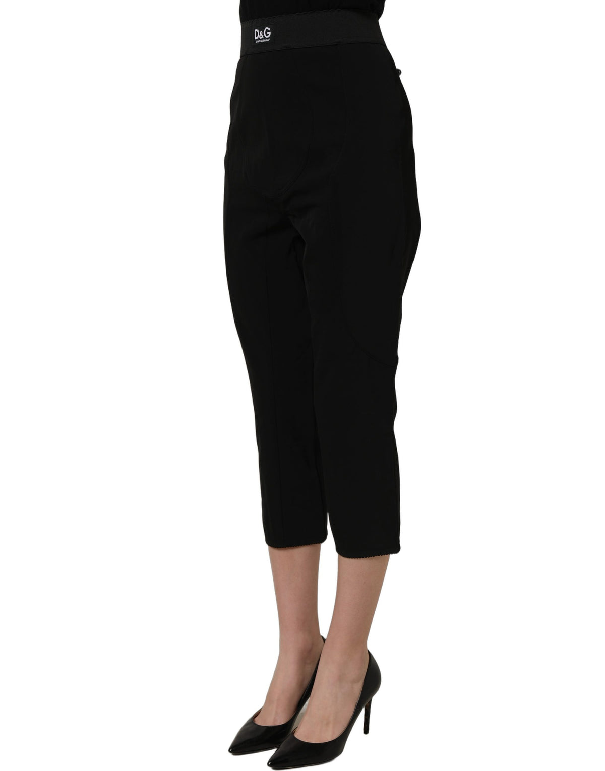 Black Dolce & Gabbana viscose high-waist capri trouser pants displayed on a hanger, showcasing the sleek, tailored design.