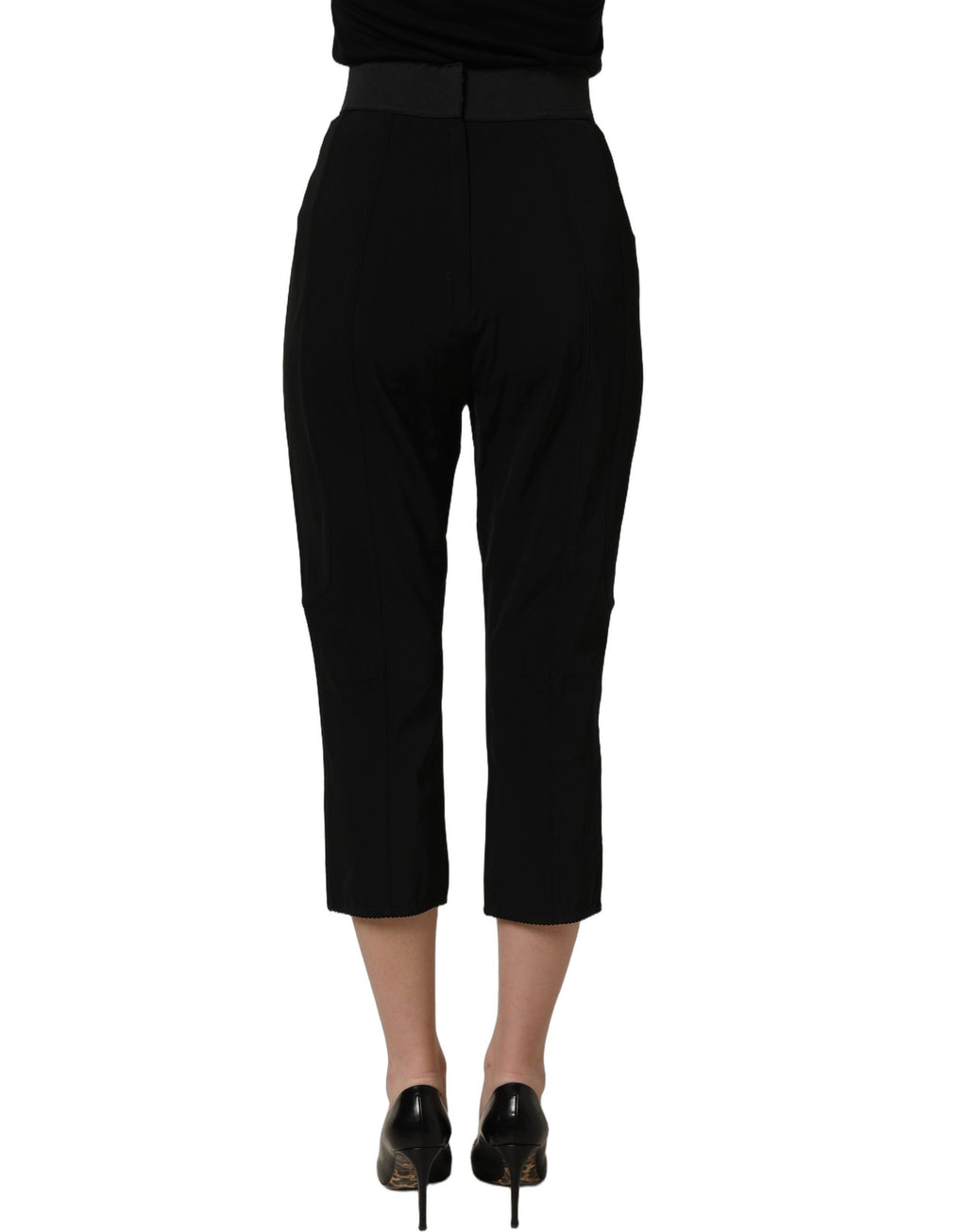 Black Dolce & Gabbana viscose high waist capri trouser pants displayed on a model, showcasing a sleek, tailored fit.