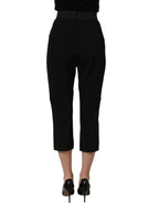 Black Dolce & Gabbana viscose high waist capri trouser pants displayed on a model, showcasing a sleek, tailored fit.