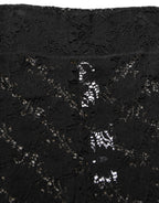 Black high waist sheer floral lace shorts by Dolce & Gabbana, featuring intricate lace details and a fitted silhouette.