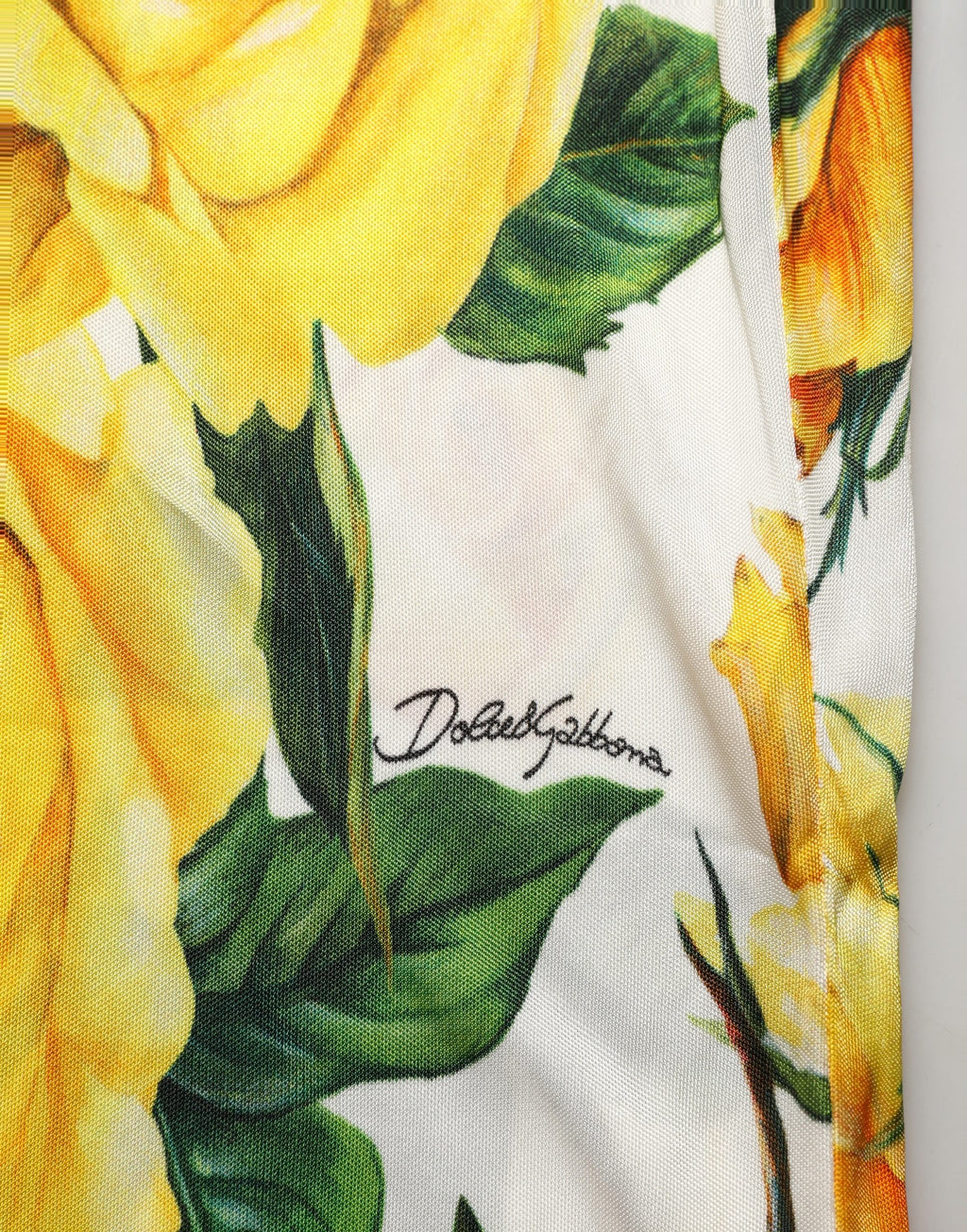 Dolce & Gabbana multicolor floral high waist straight pants with vibrant floral pattern and tailored fit.