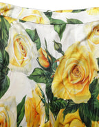 Dolce & Gabbana multicolor floral high-waist straight pants displayed on a model with a vibrant floral pattern.