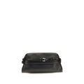 Moschino black goatskin clutch bag with sleek design and gold-tone hardware on a plain background.