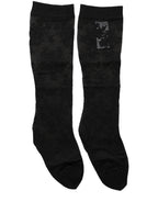 Black floral lace nylon stretch stockings by Dolce & Gabbana, featuring intricate floral patterns and sheer nylon material.
