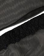 Black nylon mesh calf-length socks from Dolce & Gabbana with sheer, lightweight design and subtle branding detail.