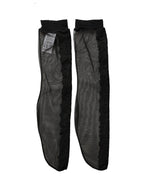 Black nylon mesh calf-length accessory socks by Dolce & Gabbana, sheer with stylish design and branding details.