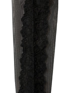 Black nylon mesh calf-length socks by Dolce & Gabbana with sheer design and long accessory style, displayed on a neutral background.