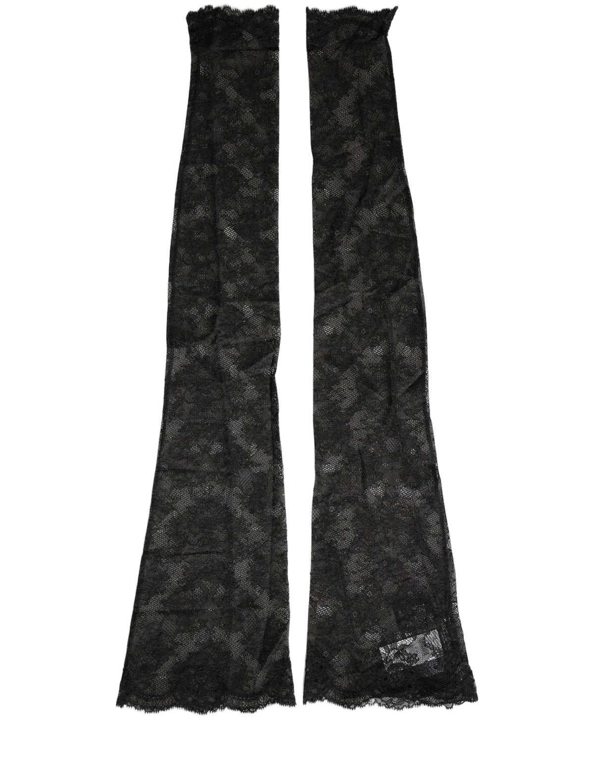 Dolce & Gabbana black floral lace nylon stretch knee-high socks displayed on a model's legs.