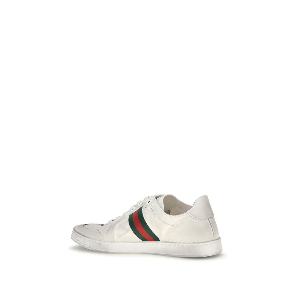 Gucci white calf leather Bos Taurus low top sneakers with sleek design and subtle branding on the side.