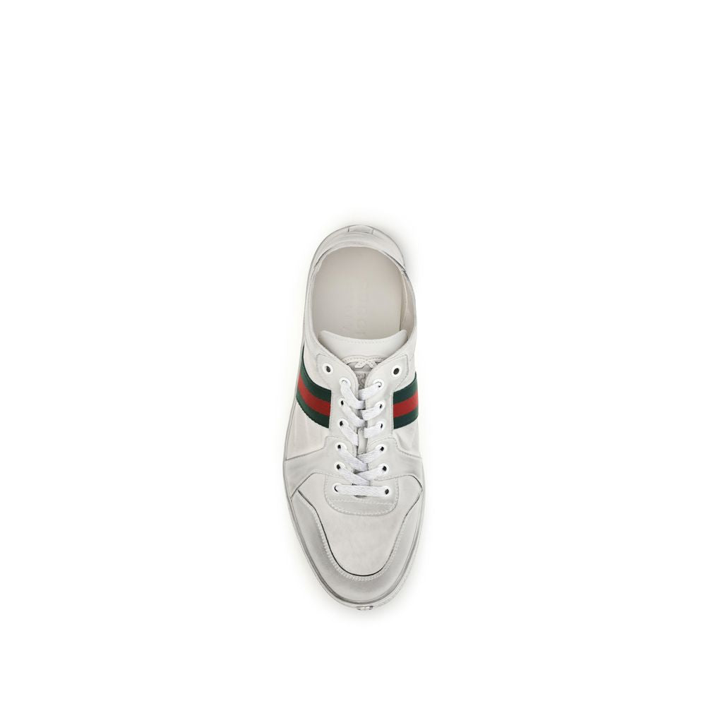 Gucci white calf leather Bos Taurus low top sneakers with sleek design and minimalist style, showing the detailed leather material.