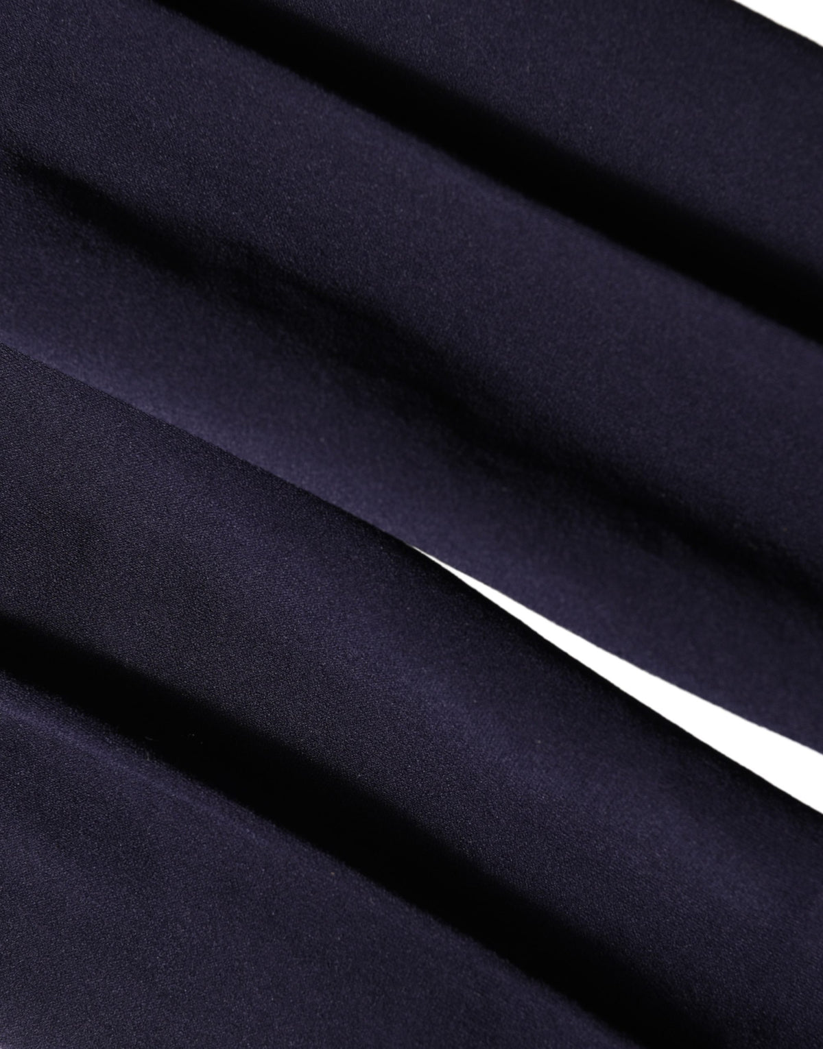 Dolce & Gabbana dark blue nylon sheer tights with a smooth, fitted appearance, displayed on a neutral background.