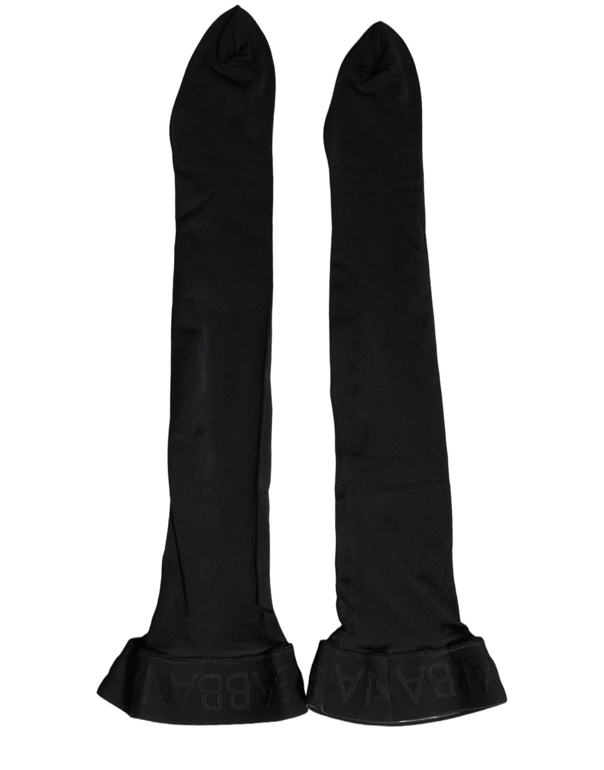 Black Dolce & Gabbana nylon thigh-high stockings laid flat, showcasing smooth texture and classic design.