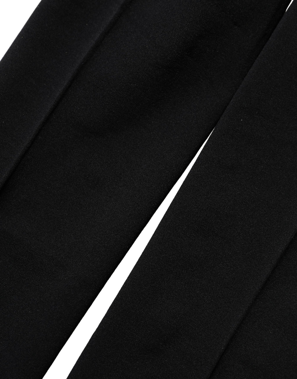 Dolce & Gabbana black nylon sheer tights with a smooth, sheer finish, designed as elegant hosiery for women.