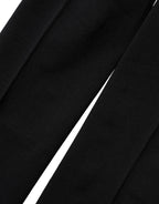 Dolce & Gabbana black nylon sheer tights with a smooth, sheer finish, designed as elegant hosiery for women.