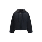 Moose Knuckles black nylon bomber jacket with a fitted collar and zip closure, displayed on a hanger.