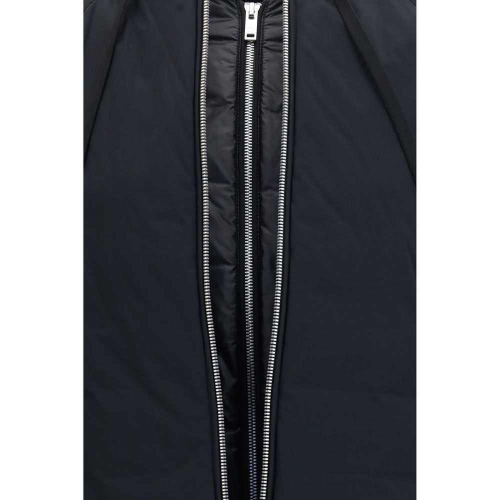 Black nylon Moose Knuckles bomber jacket with a sleek design and zipper details, displayed on a hanger.
