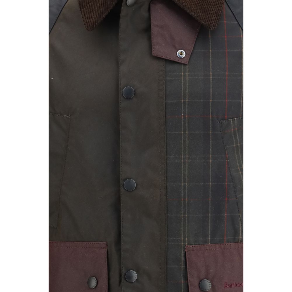Barbour multicolor cotton shell jacket displayed on a hanger, featuring a lightweight design and vibrant color pattern.