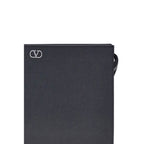 Valentino Garavani black calf leather Bos Taurus wallet with sleek design and subtle branding, perfect for stylish organization.