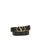 Black leather belt from Valentino Garavani with a sleek design and metal buckle, crafted from calf leather for a refined look.