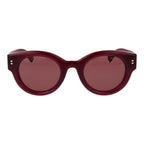 Polaroid purple plastic sunglasses with thick frames and tinted lenses, stylish eyewear for sun protection.