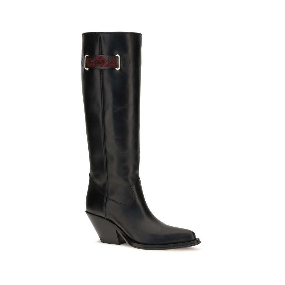 Chloé black calf leather Bos Taurus over-the-knee boots shown from the side with a sleek, fitted design and pointed toe.