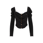 Black silk cardigan by Vivienne Westwood featuring a classic design and button closure.