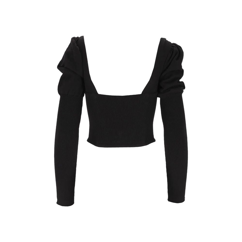 Black silk cardigan by Vivienne Westwood featuring a classic design and button closure, displayed on a plain background.